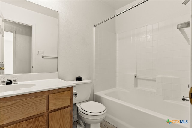 full bathroom featuring shower / bathing tub combination, vanity, and toilet