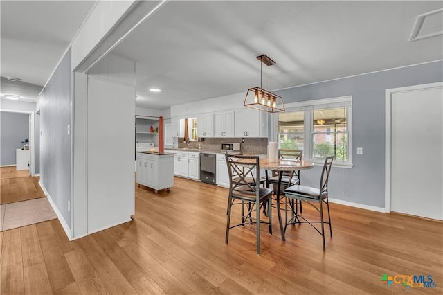 404 Oak St, Copperas Cove, TX 76522 - dining space with light wood finished floors, baseboards, and recessed lighting