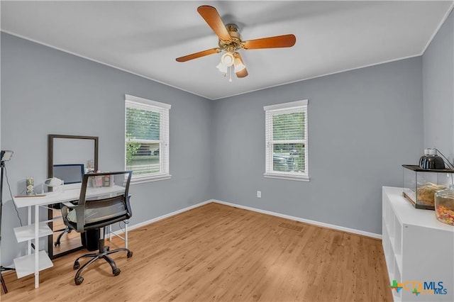 404 Oak St, Copperas Cove, TX 76522 - home office featuring plenty of natural light, wood finished floors, and baseboards