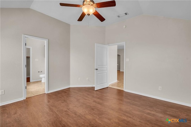 2922 Starlight Dr, Copperas Cove, TX 76522 - unfurnished room with lofted ceiling, ceiling fan, wood finished floors, arched walkways, and baseboards