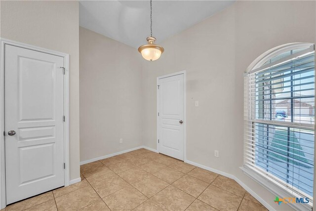 2922 Starlight Dr, Copperas Cove, TX 76522 - spare room with plenty of natural light, light tile patterned flooring, baseboards, and high vaulted ceiling