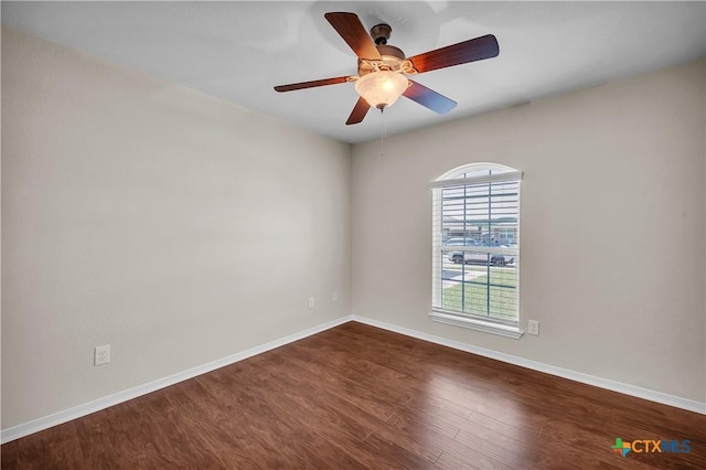 2922 Starlight Dr, Copperas Cove, TX 76522 - unfurnished room with dark wood-type flooring, baseboards, and ceiling fan