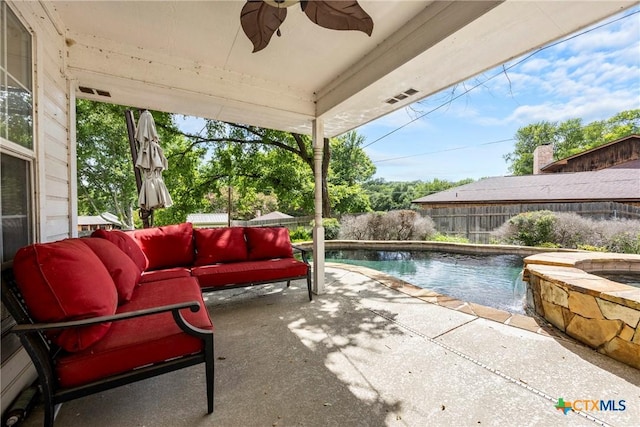 4501 Arrowhead Dr, Temple, TX 76502 - outdoor pool featuring a fenced backyard, a patio area, a ceiling fan, and outdoor lounge area