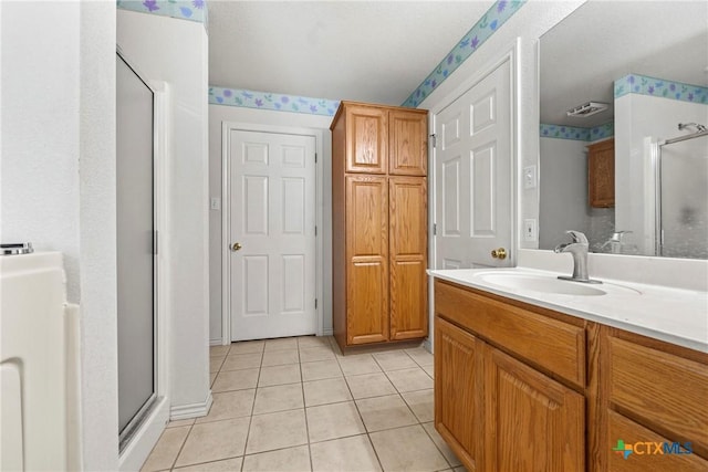 4501 Arrowhead Dr, Temple, TX 76502 - full bath with a stall shower, tile patterned floors, and vanity