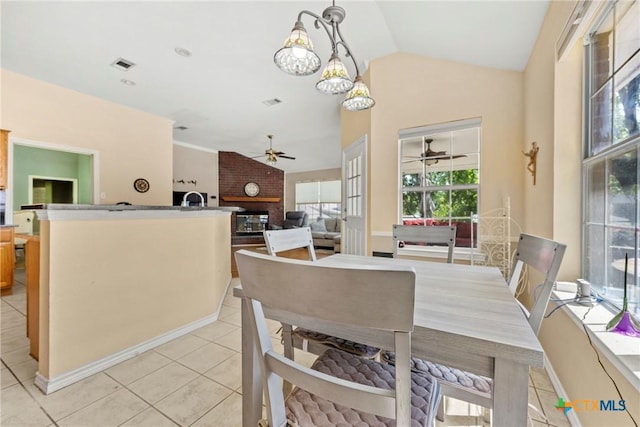 4501 Arrowhead Dr, Temple, TX 76502 - dining room with a ceiling fan, vaulted ceiling, and light tile patterned flooring