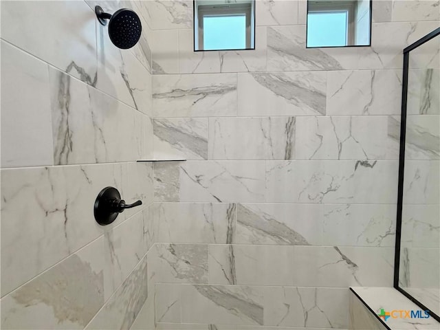 2021 Yarrow Rd, Temple, TX 76502 - bathroom featuring a tile shower and healthy amount of natural light