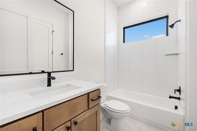 full bathroom with vanity, toilet, and tiled shower / bath combo