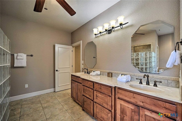 bathroom featuring ceiling fan, tile patterned floors, and vanity