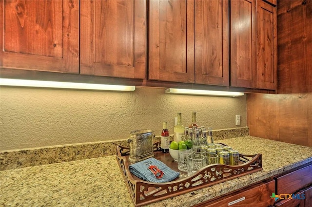 kitchen featuring light stone countertops