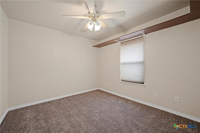 empty room with carpet flooring and ceiling fan