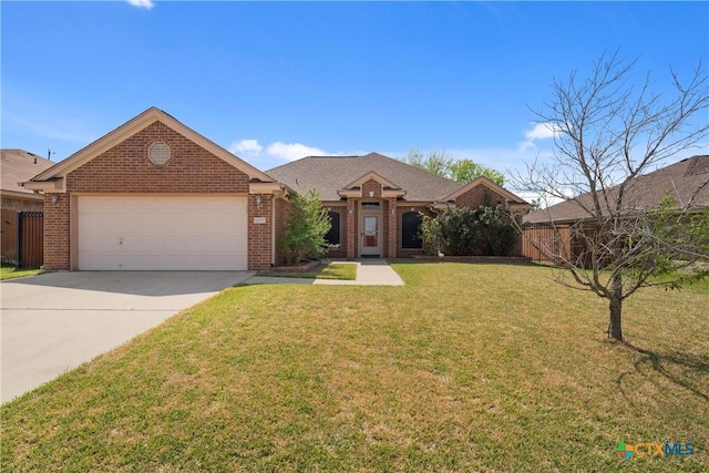 ranch-style home with a garage and a front yard