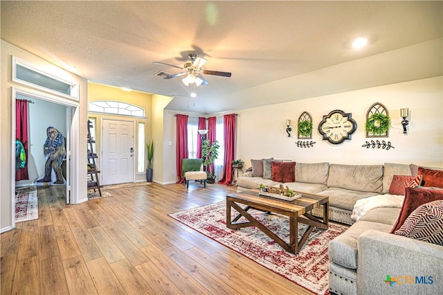 9300 Vaquero Way, Killeen, TX 76542 - living area with hardwood / wood-style floors, a ceiling fan, and baseboards