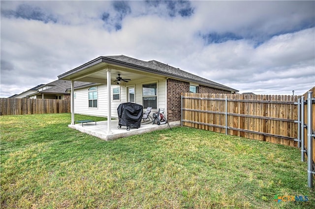 9300 Vaquero Way, Killeen, TX 76542 - rear view of property featuring a ceiling fan, brick siding, and a patio area