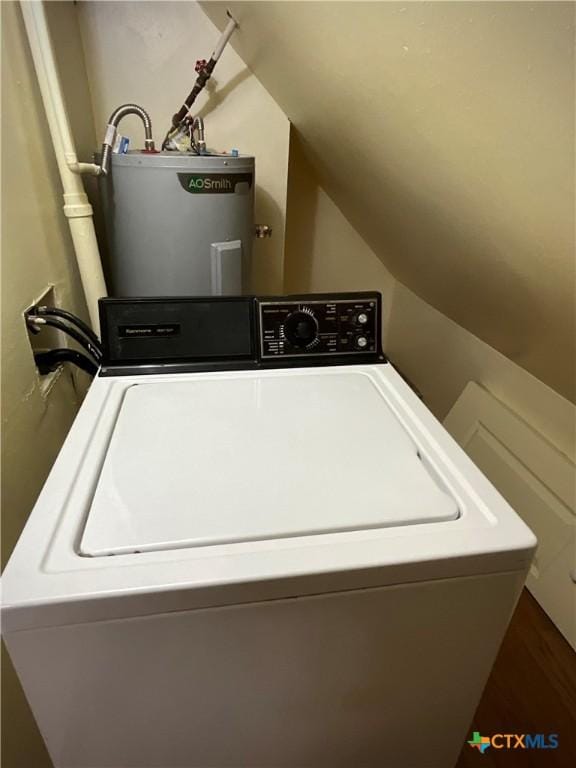 364 N Blackburn Ave, Port Lavaca, TX 77979 - washroom with water heater, washer / clothes dryer, and wood finished floors