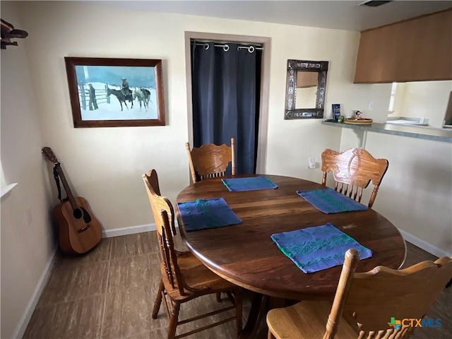 364 N Blackburn Ave, Port Lavaca, TX 77979 - dining space with baseboards