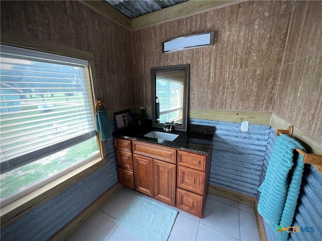 364 N Blackburn Ave, Port Lavaca, TX 77979 - bathroom with healthy amount of natural light, vanity, and tile patterned floors