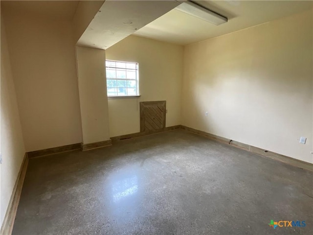 364 N Blackburn Ave, Port Lavaca, TX 77979 - spare room featuring concrete flooring and baseboards