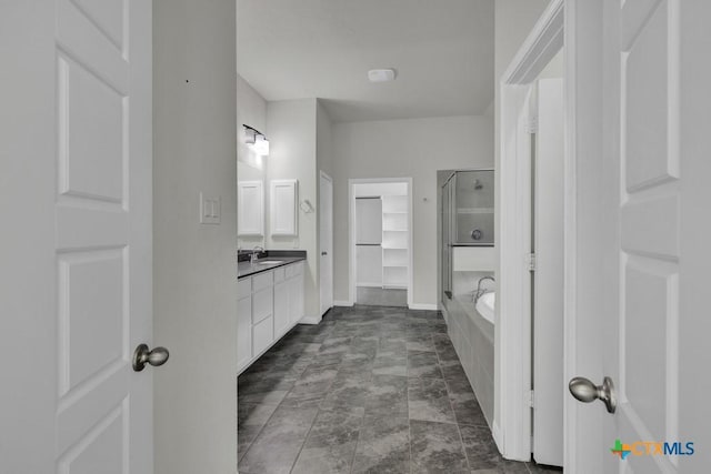 129 La Cima, Boerne, TX 78006 - bathroom with vanity, a shower stall, and a bath