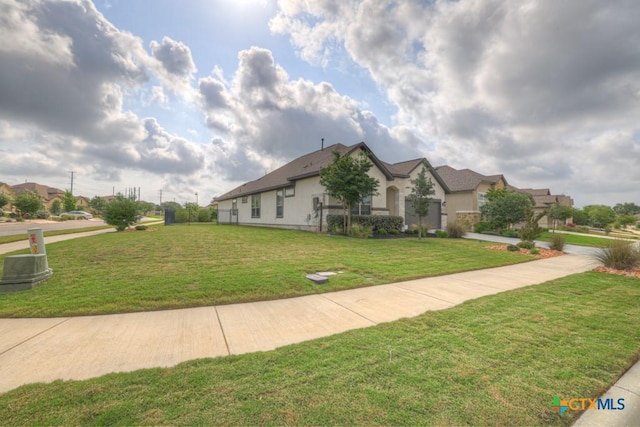 129 La Cima, Boerne, TX 78006 - view of front of property with a front yard and stucco siding