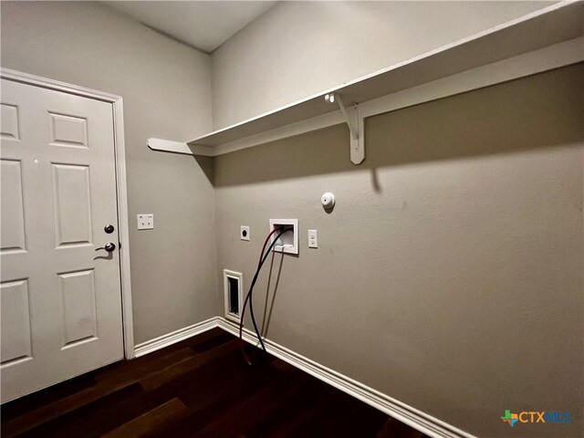 313 Rorem Ave, Palacios, TX 77465 - laundry area featuring dark wood finished floors, hookup for a washing machine, laundry area, hookup for an electric dryer, and baseboards