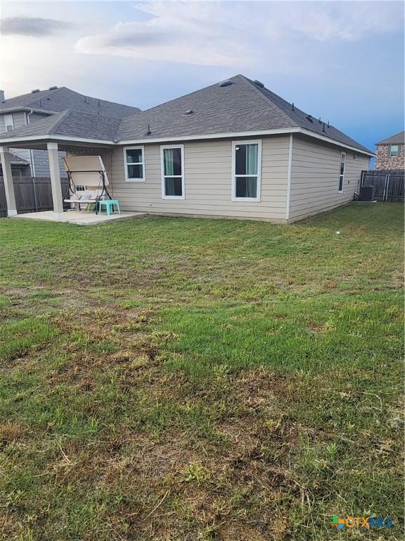 1306 Daniel Dr, Belton, TX 76513 - back of property featuring a patio
