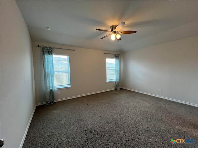 carpeted empty room featuring ceiling fan