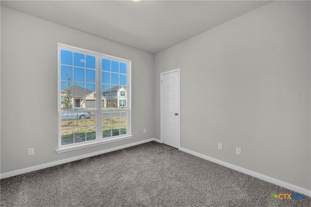 view of carpeted spare room