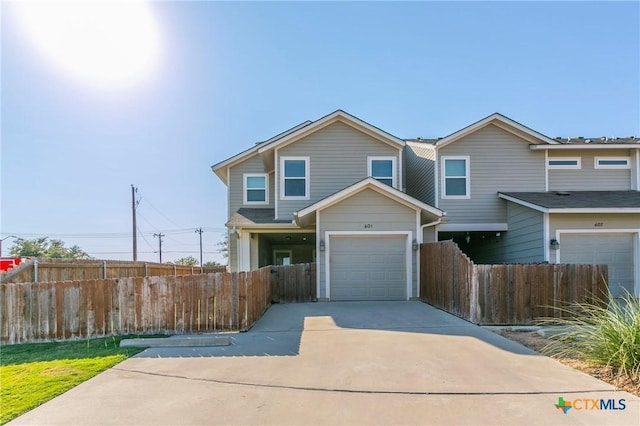 601 Westfield Blvd, Temple, TX 76502 - view of front facade with fence, driveway, and an attached garage