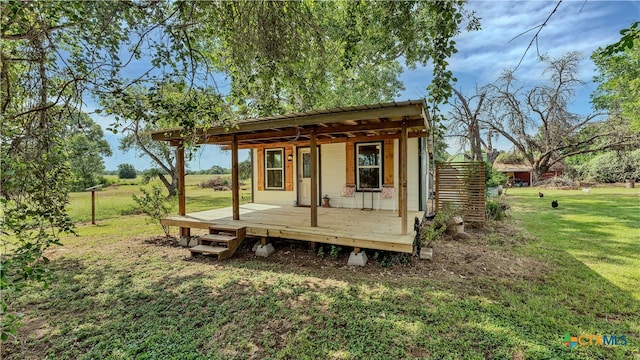 view of outbuilding featuring a yard