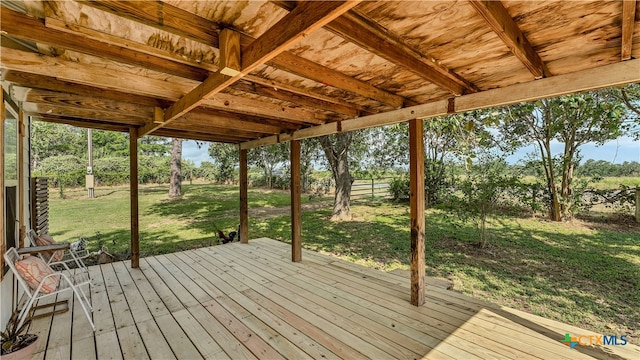 deck featuring a lawn