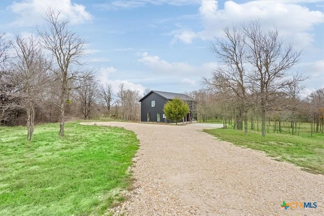 exterior space with a rural view