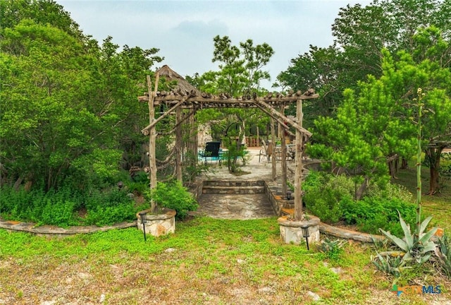 1218 Oakwood Loop, San Marcos, TX 78666 - view of yard featuring a patio area