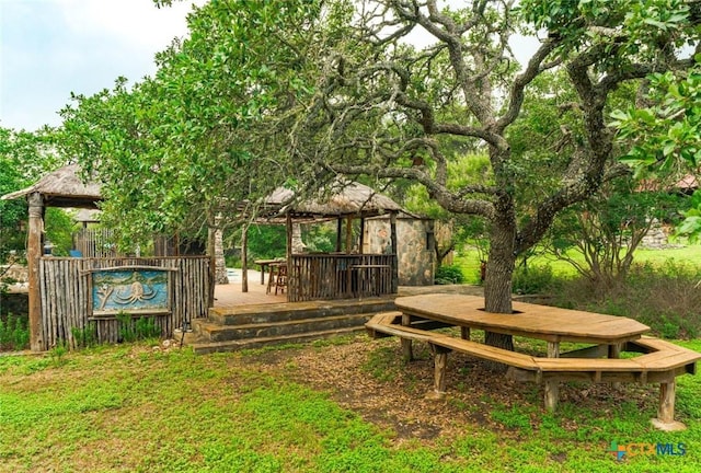 1218 Oakwood Loop, San Marcos, TX 78666 - view of community featuring a gazebo and a wooden deck