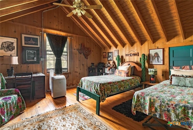 1218 Oakwood Loop, San Marcos, TX 78666 - bedroom with light wood-style floors, wooden ceiling, and wood walls