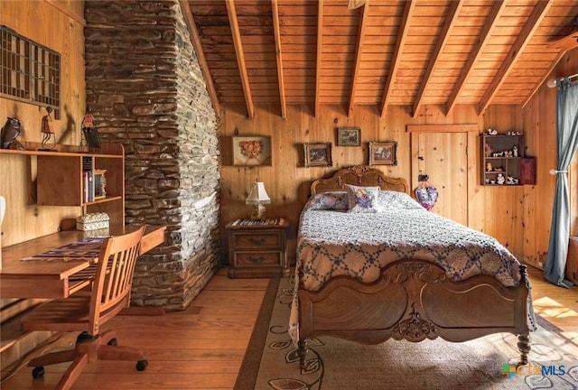 1218 Oakwood Loop, San Marcos, TX 78666 - bedroom with hardwood / wood-style flooring, wood ceiling, and wood walls