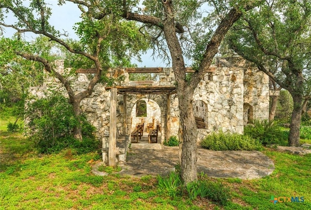 1218 Oakwood Loop, San Marcos, TX 78666 - view of front of property with stone siding