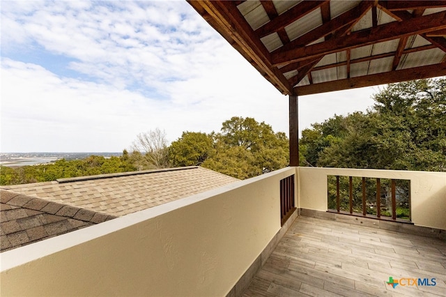 balcony featuring a water view