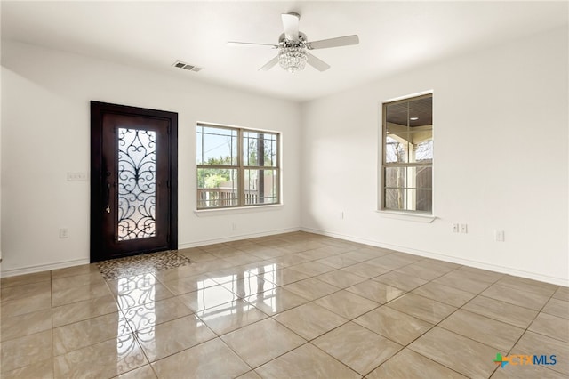 foyer featuring ceiling fan