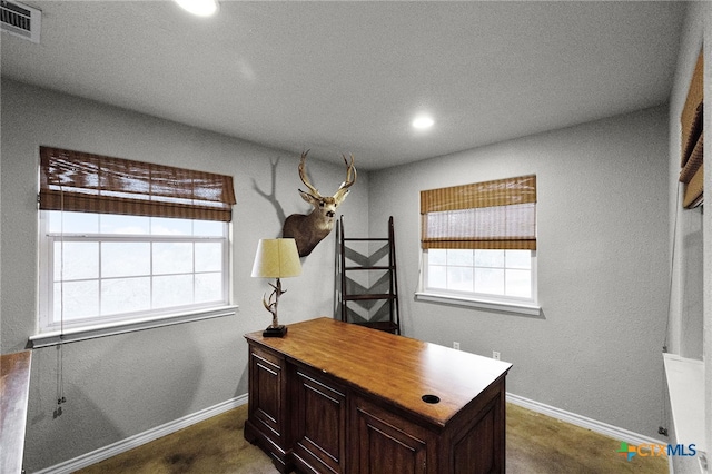 office featuring baseboards, visible vents, and recessed lighting