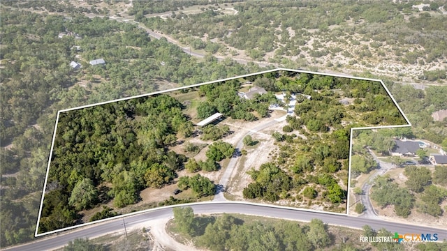 bird's eye view featuring a view of trees