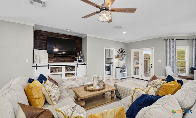 living room featuring visible vents, recessed lighting, ornamental molding, and a ceiling fan