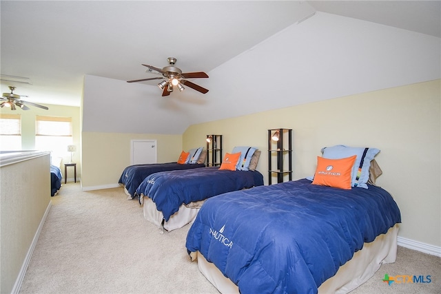 carpeted bedroom featuring ceiling fan and lofted ceiling