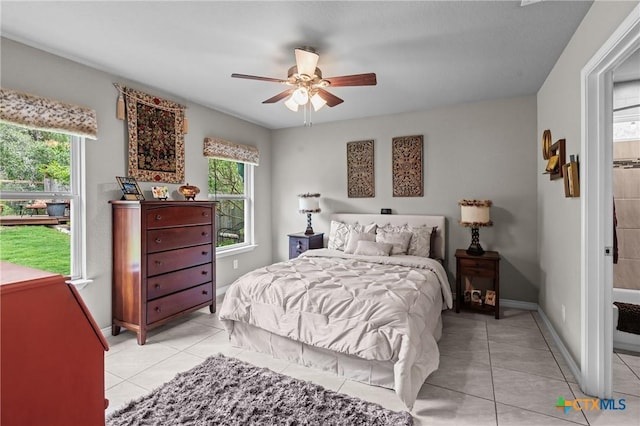 182 Palm, Spring Branch, TX 78070 - bedroom featuring light tile patterned floors and ceiling fan