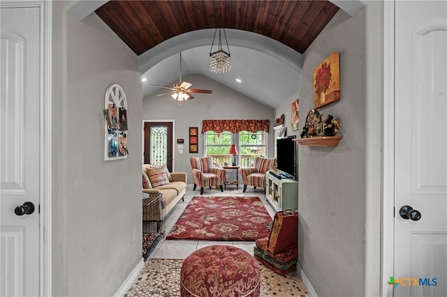 182 Palm, Spring Branch, TX 78070 - living room featuring vaulted ceiling, a ceiling fan, arched walkways, tile patterned floors, and recessed lighting