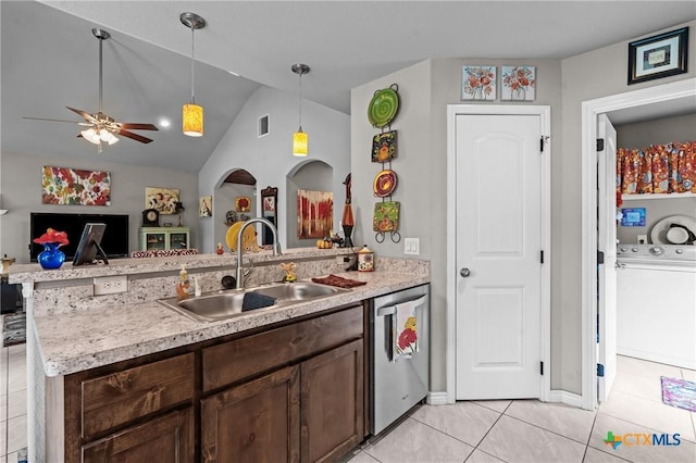 182 Palm, Spring Branch, TX 78070 - kitchen featuring stainless steel dishwasher, light tile patterned floors, a peninsula, light countertops, and dark brown cabinetry