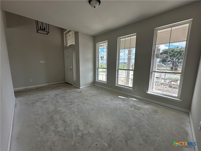 empty room with a textured ceiling