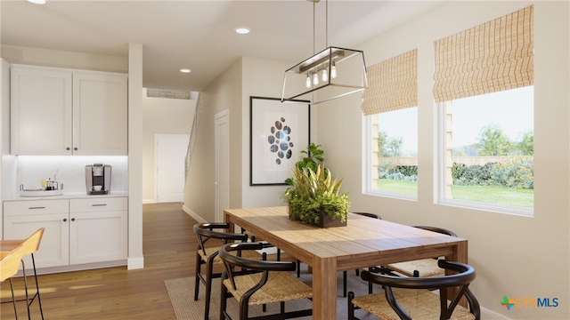 dining space with dark wood-type flooring