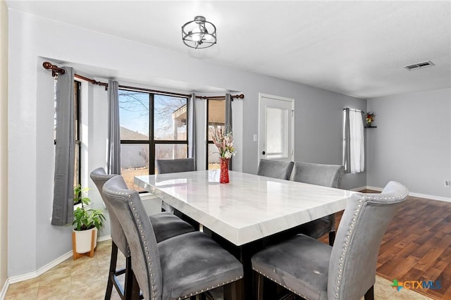 dining area featuring light hardwood / wood-style floors