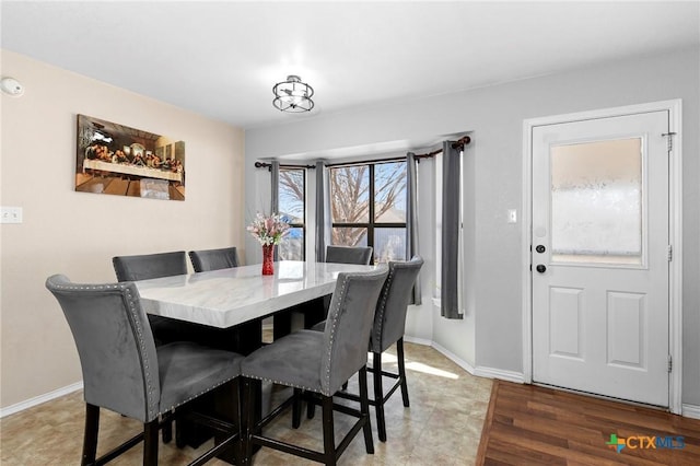 dining room with hardwood / wood-style floors