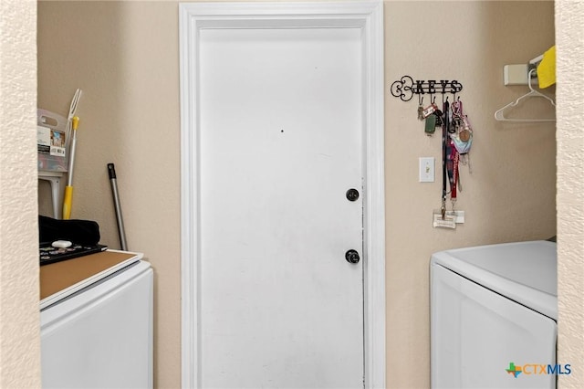 laundry room featuring washer and dryer